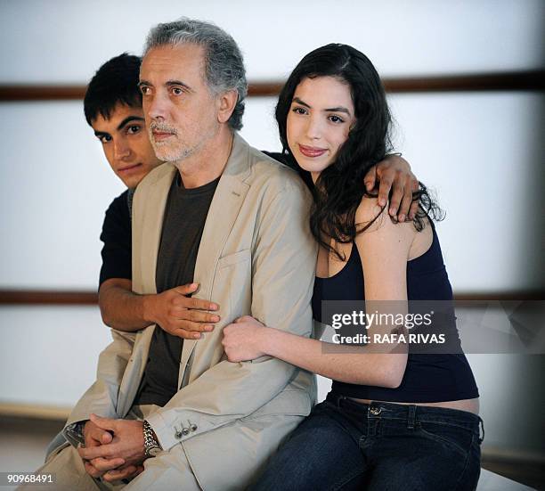 Spanish director Fernando Trueba poses with actors Abel Ayala and Miranda Bodenhofer after the screening of his film "El Baile de la Victoria" during...