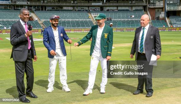 Captain Faf du Plessis of South Africa and captain Virat Kohli of India toss during day 1 of the 3rd Sunfoil Test match between South Africa and...