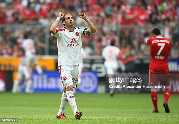 Javier Pinola of Nuernberg celebrates the first team goal during the Bundesliga match between FC Bayern Muenchen and 1. FC Nuernberg at Allianz Arena...