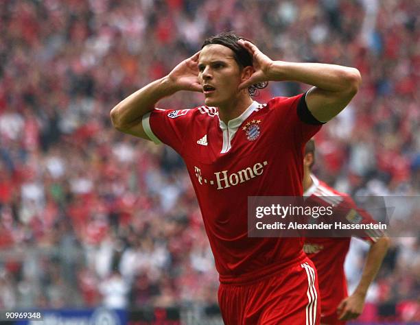 Daniel van Buyten of Muenchen celebrates scoring thesecond team goal during the Bundesliga match between FC Bayern Muenchen and 1. FC Nuernberg at...