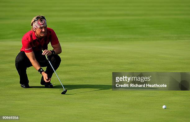 Pelle Edberg of Sweden lines up a putt on the 14th during the third round of the Austrian Golf Open at Fontana Golf Club on September 19, 2009 in...