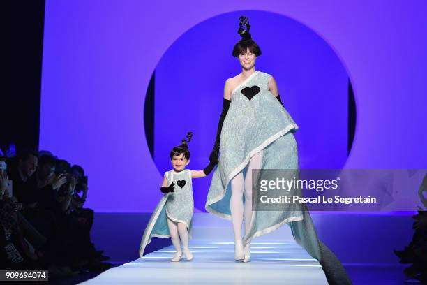 Coco Rocha and her daughter Ioni Conran walk the runway during the Jean-Paul Gaultier Spring Summer 2018 show as part of Paris Fashion Week on...