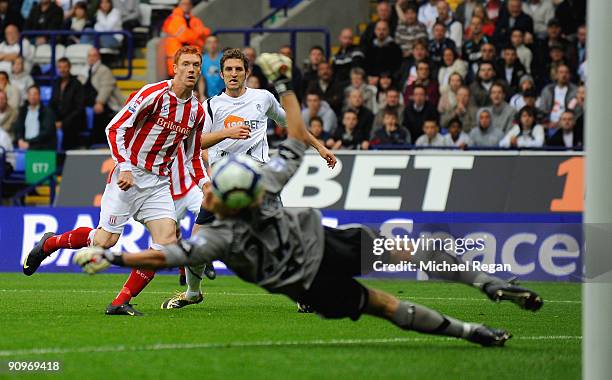 Dave Kitson of Stoke scores the opening goal past Bolton's goalkeeper Jussi Jaaskelainen during the Barclays Premier League match between Bolton...