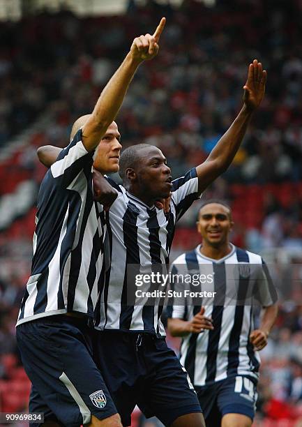 Roman Bednar of West Bromwich celebrates his goal with Jerome Thomas and Yousuff Mulumbu during the Coca-Cola Championship match between...