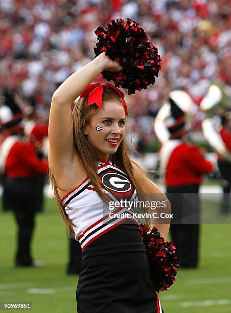 Cheerleader of the Georgia Bulldogs cheers before the game against the South Carolina Gamecocks at Sanford Stadium on September 12, 2009 in Athens,...