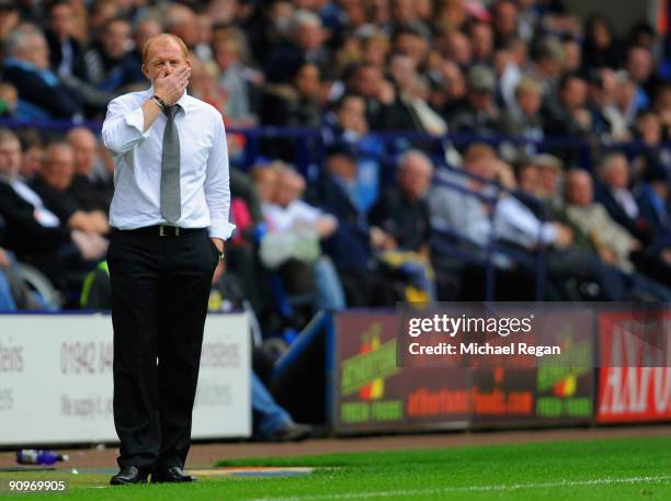 Bolton manager Gary Megson reacts during the Barclays Premier League match between Bolton Wanderers and Stoke City at the Reebok Stadium on September...