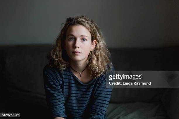 portrait of a beautiful serious young woman - serious stock pictures, royalty-free photos & images