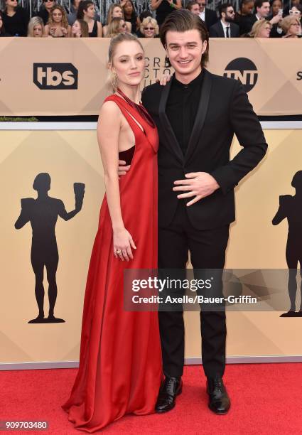 Actors Maika Monroe and Joe Keery attend the 24th Annual Screen Actors Guild Awards at The Shrine Auditorium on January 21, 2018 in Los Angeles,...