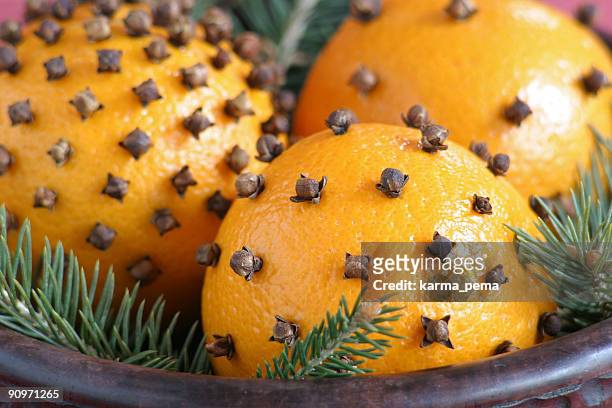 orange with clove - orange stock pictures, royalty-free photos & images