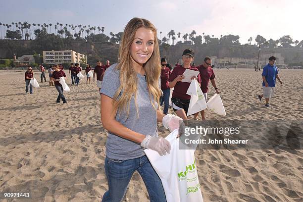 Personality/ Designer Lauren Conrad cleans up trash during Kohl's Department Stores "Clean Up" at Santa Monica Beach on September 19, 2009 in Santa...
