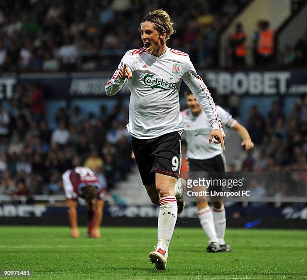 Fernando Torres of Liverpool celebrates after scoring the 3-2 goal for his team during the Barclays Premier League match between West Ham and...