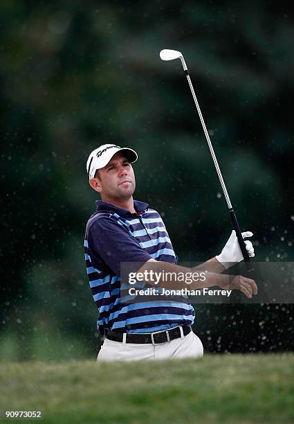 Josh Teater hits out of the bunker on the 9th hole during the third round of the Albertson's Boise Open at Hillcrest Country Club on September 18,...