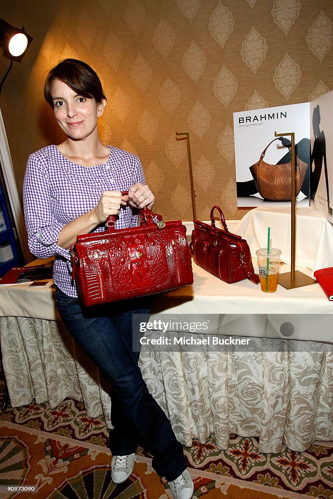 Actress Tina Fey poses at the Brahmin booth during the HBO Luxury News  Photo - Getty Images