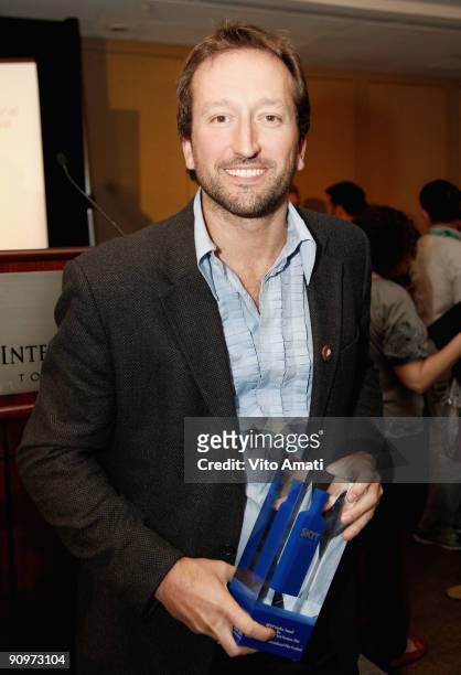Director Alexandre Franchi with the award for Best Canadian First Feature Film as he attends the Awards Ceremony held at The Visa Screening Room at...