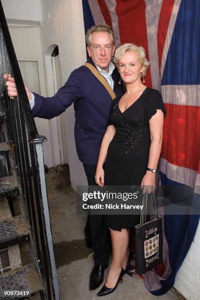 Michael Howells and Kitty Arden attend the opening of the Kinder Aggugini & Camilla Lowther Flash Boutique during London Fashion Week Spring/Summer...