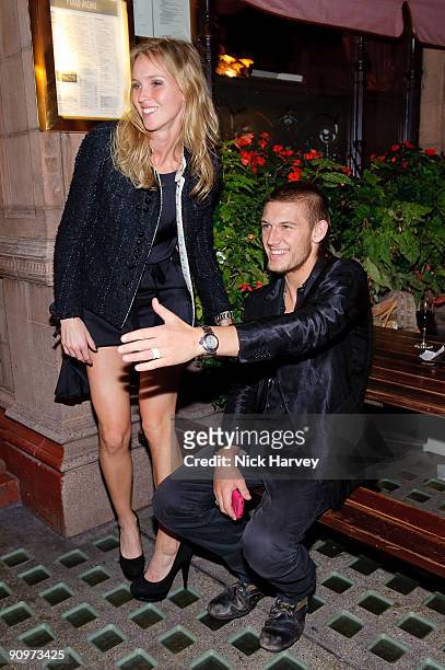 Emily and Alex Pettyfer attend the opening of the Kinder Aggugini & Camilla Lowther Flash Boutique during London Fashion Week Spring/Summer 2010 on...