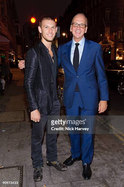 Actor and model, Alex Pettyfer and designer Richard James attend the opening of the Kinder Aggugini & Camilla Lowther Flash Boutique during London...
