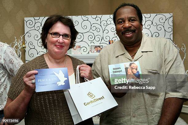Actress Phyllis Smith and actor Leslie David Baker pose at the CardsDirect booth during the HBO Luxury Lounge in honor of the 61st Primetime Emmy...