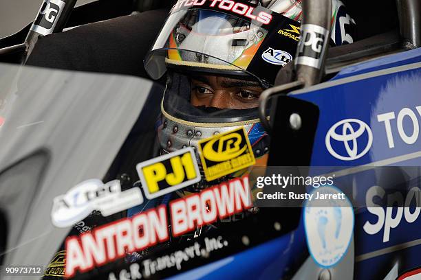 Antron Brown, driver of the Matco Tools top fuel dragster prepares to drive during qualifying for the NHRA Carolinas Nationals on September 19, 2009...