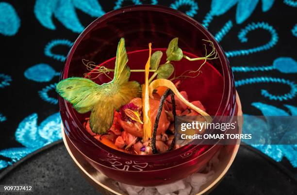 Dish called Vampire Ceviche" made with Sangrita -non alcoholic beverage of tomato, lime and orange juice, seasoned with chili pepper, Worcestershire...