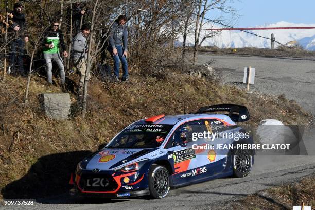 Spanish's driver Daniel Sordo and his co-pilot Carlos DEl Barrio steer their Hyundai WRT on January 24, 2018 in Gap, southeastern France, during the...