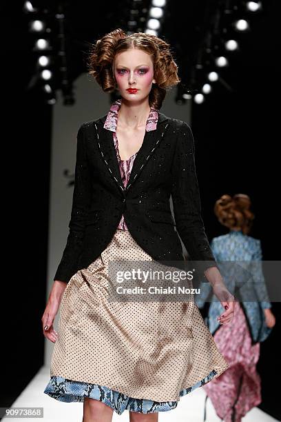 Model walks down the runway during the Kinder Aggugini show at LFW Spring Summer 2010 fashion show at Somerset House on September 19, 2009 in London,...