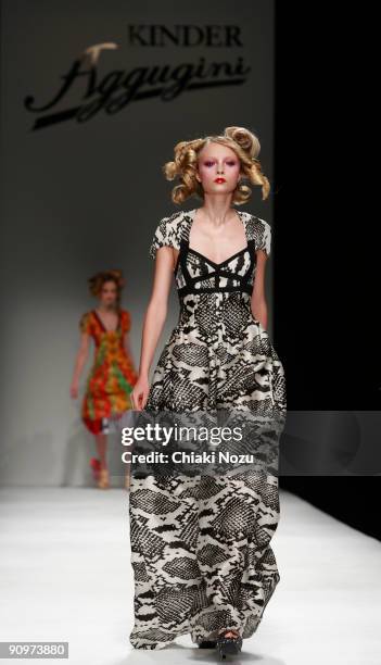 Model walks down the runway during the Kinder Aggugini show at LFW Spring Summer 2010 fashion show at Somerset House on September 19, 2009 in London,...