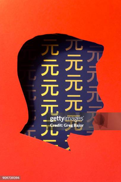 human head and chinese currency - greg bajor stock-fotos und bilder