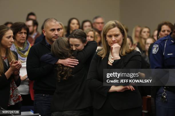 Michigan Assistant Attorney General Angela Povilaitis stands as former Michigan State University and USA Gymnastics doctor Larry Nassar listens...