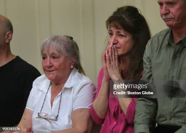 John Feroli's mother Maguerite, left, and his sister Donna Feroli-Karo stand after the judge asked if any of his family members were in court during...