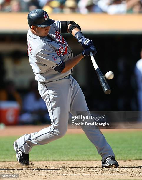 Jhonny Peralta of the Cleveland Indians bats against the Oakland Athletics during the game at the Oakland-Alameda County Coliseum on September 19,...