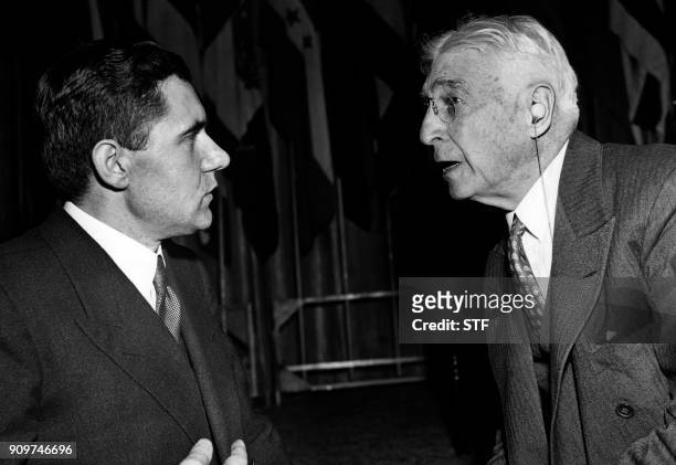 Financier and politician Bernard Baruch speaks with permanent Representative of the Soviet Union to the United Nations Andrei Gromyko during a...