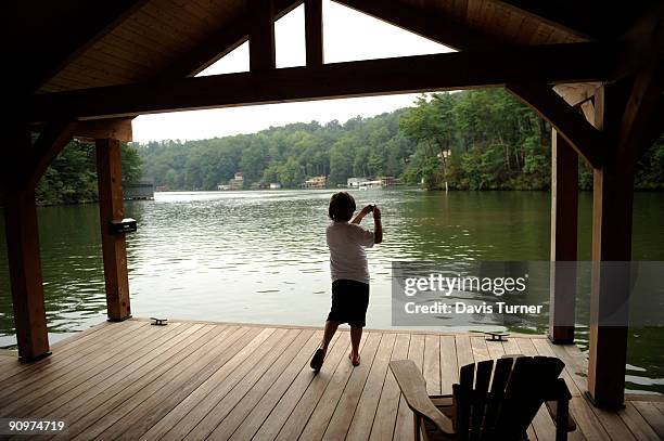 Kendra Spann photographs the cove used for practicing "the lift" from the movie Dirty Dancing September 19, 2009 in Lake Lure, North Carolina. A...