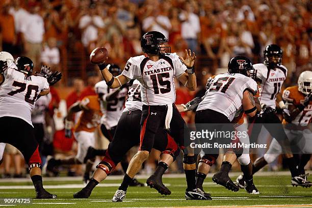 Quarterback Taylor Potts of the Texas Tech Red Raiders drops back to pass against the Texas Longhorns at Darrell K Royal-Texas Memorial Stadium on...