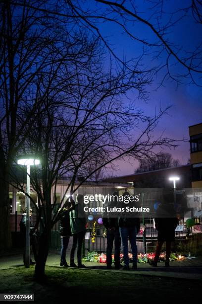 People mourn at a makeshift memorial placed in front of the Kaethe Kollwitz comprehensive school following the stabbing of a pupil yesterday on...