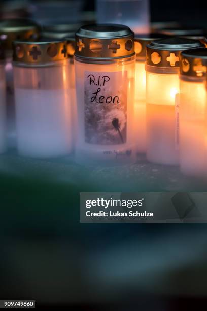 Candles are left at a makeshift memorial placed in front of the Kaethe Kollwitz comprehensive school following the stabbing of a pupil yesterday on...