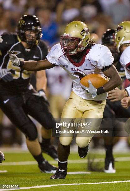 Running back Jamal Shuman of the Elon Phoenix looks looks for running room during second half action against the Wake Forest Demon Deacons at BB&T...