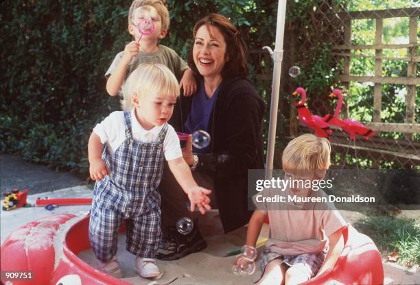 Patricia Heaton, star of "Everybody Loves Raymond" with her kids, Sam, Joe and David. Photo by Maureen Donaldson/Online USA, Inc.