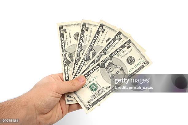 five dollar bills held in a man's hand - animal finger stockfoto's en -beelden