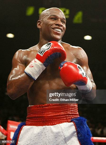 Floyd Mayweather Jr. Smiles during his fight against Juan Manuel Marquez of Mexico during their welterweight bout at the MGM Grand Garden Arena...