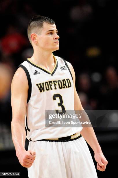 Fletcher Magee guard Wofford College Terriers checks the bench for signals against the University of Tennessee Chattanooga Mocs, Saturday, January 20...