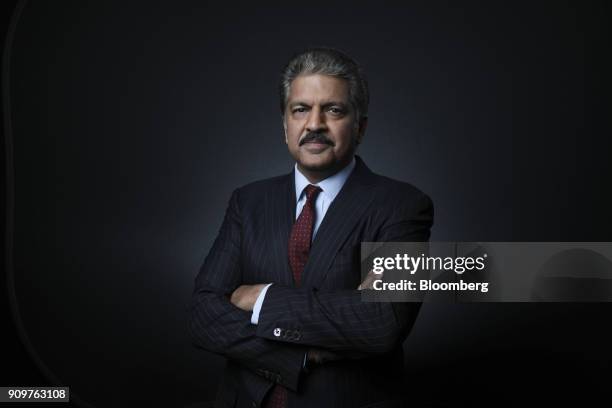 Anand Mahindra, chairman of Mahindra & Mahindra Ltd., poses for a photograph following a Bloomberg Television interview on day two of the World...