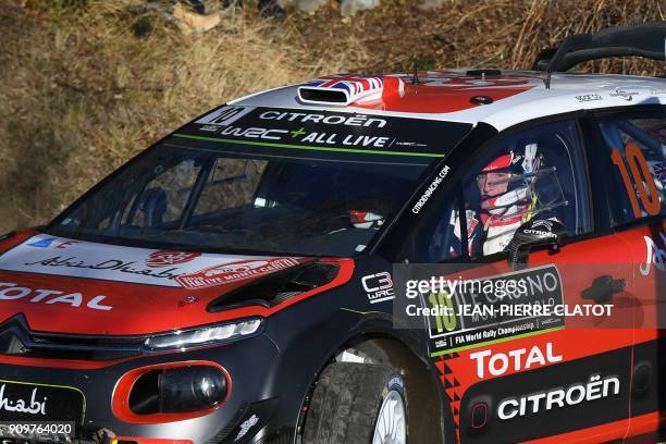 British's driver Kris Meeke and his co-pilot Paul Nagle steer their Citroen C3 WRT on January 24, 2018 in Gap, southeastern France, during the...