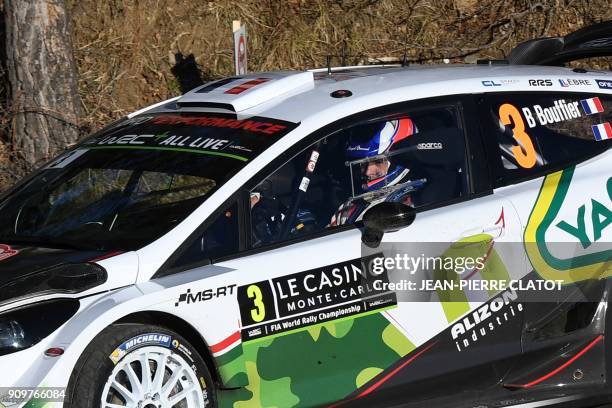 French's driver Bryan Bouffier and his co-pilot Jerome Degout steer their Ford Fiesta RS WRC on January 24, 2018 in Gap, southeastern France, during...