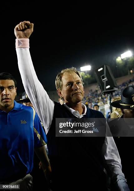Bruins head coach Rick Neuheisel celebrates following the Bruins victory over the Kansas State Wildcats at the Rose Bowl on September 19, 2009 in...