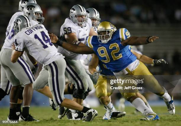 Brian Price of the UCLA Bruins hurries quarterback Carson Coffman of the Kansas State Wildcats in the fourth quarter at the Rose Bowl on September...