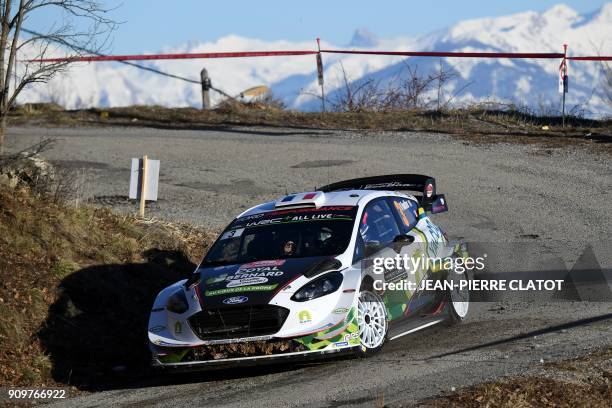 French's driver Bryan Bouffier and his co-pilot Jerome Degout steer their Ford Fiesta RS WRC on January 24, 2018 in Gap, southeastern France, during...