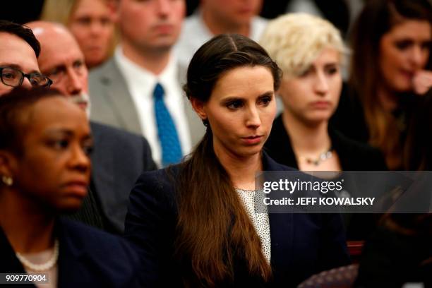 Rachael Denhollander who was victimized by former Michigan State University and USA Gymnastics doctor Larry Nassar listens during the sentencing...