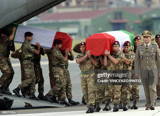 Coffins with bodies of six Italian soldiers of the NATO-led International Security Assistance Force killed in a suicide attack in Kabul on September...
