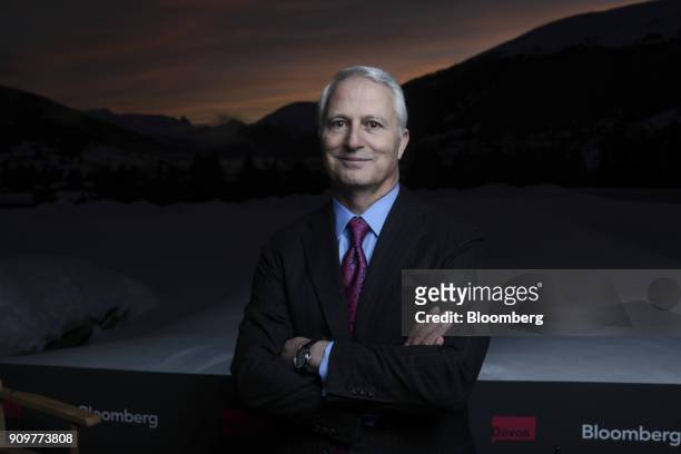 Jim Amine, chief executive officer of investment banking at Credit Suisse Group AG, poses for a photograph following a Bloomberg Television interview...